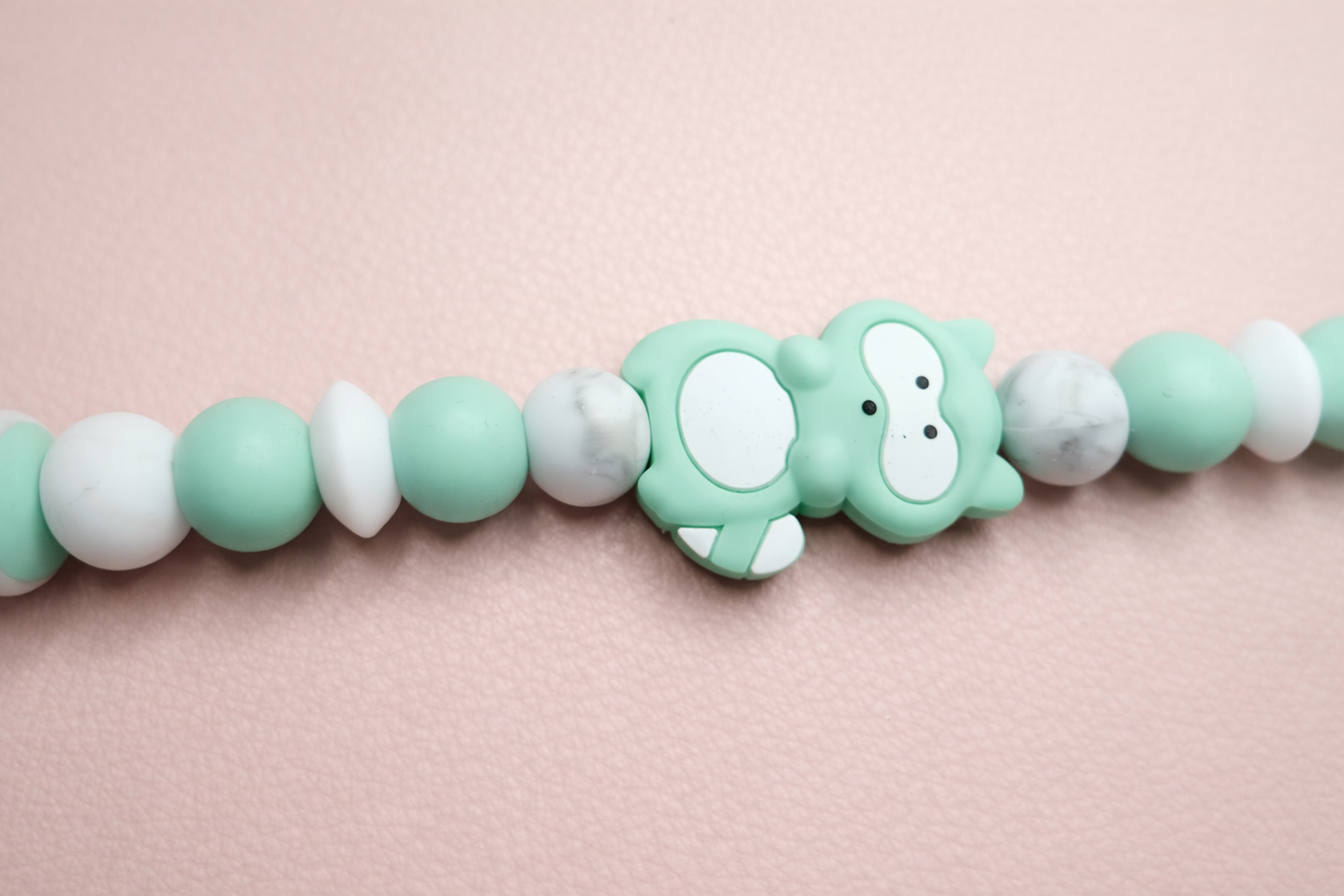 Minty Squirrel Pacifier Clip & Sensory Piece